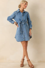 Front-facing shot highlighting the long sleeves with button cuffs and paneled design.
