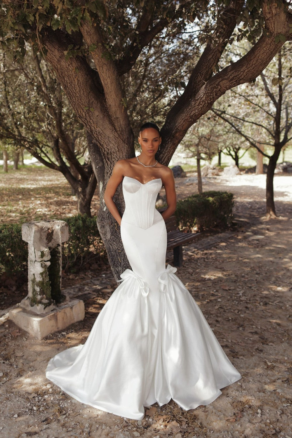Modern And Minimalist Satin Mermaid Wedding Dress With Bows by Love by Pnina Tornai — image 1 of 2