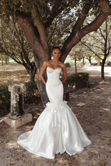 Modern And Minimalist Satin Mermaid Wedding Dress With Bows by Love by Pnina Tornai — image 1 of 2