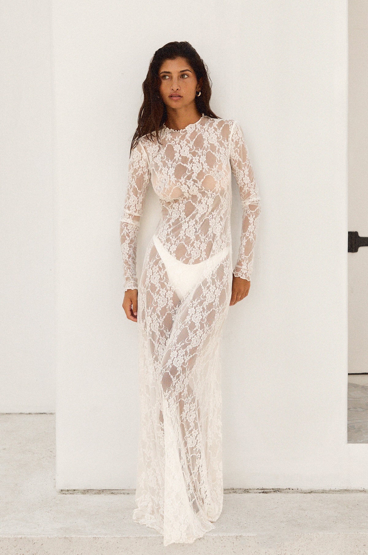 This is an image of Lyon Lace Dress in White Lace - RESA featuring a model wearing the dress