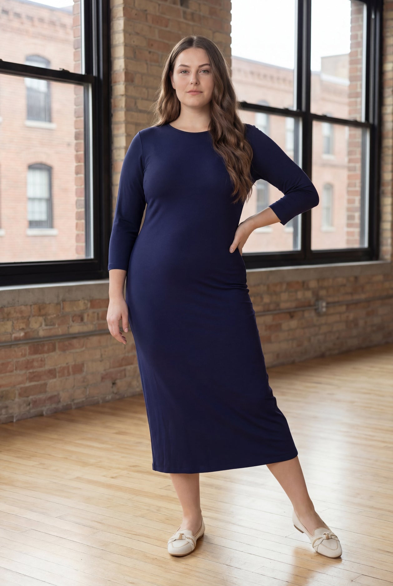 Model wearing Nuggles® Midi Layering Dress in Navy