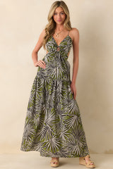 Full body front view of the olive green maxi dress showcasing the black and white palm frond print and v-neckline.