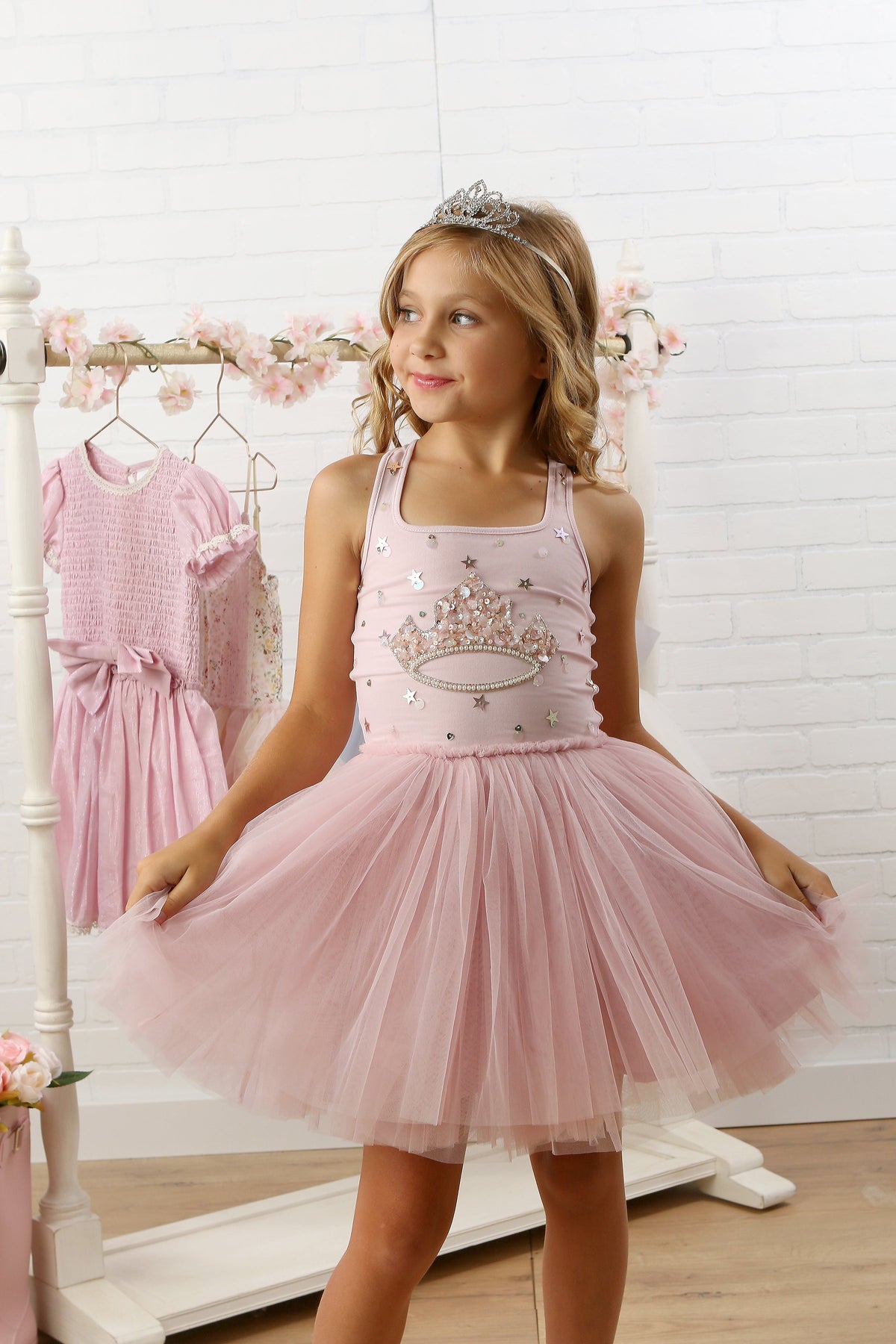 girls pink princess dress with crown at the chest