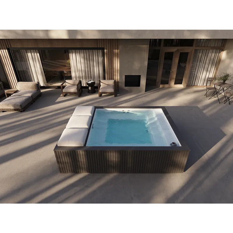 Portcril Mirage Spa Whirlpool mit Massagedüsen in moderner Terrasse mit Loungebereich