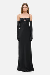 Model in Tulip dress and long black Manon gloves with a scalloped trim, front view