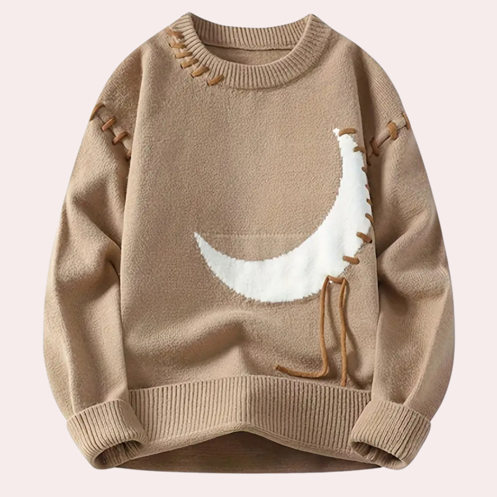 Beige genser med hvit halvmåne-design, dekorative sømmer og ribbestrikkede kanter. Perfekt for høst- og vintermote. Unisex genser.